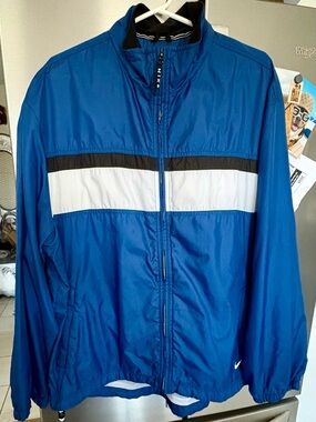 Vintage Nike Men’s Royal Blue Windbreaker Jacket with White and Black Stripe